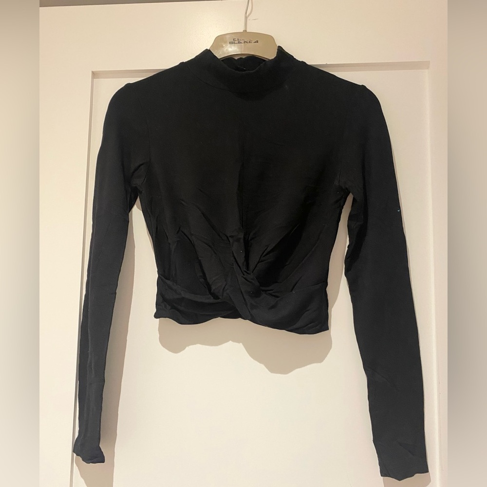 Top shop mock neck, black crop top with cross over design in the front.